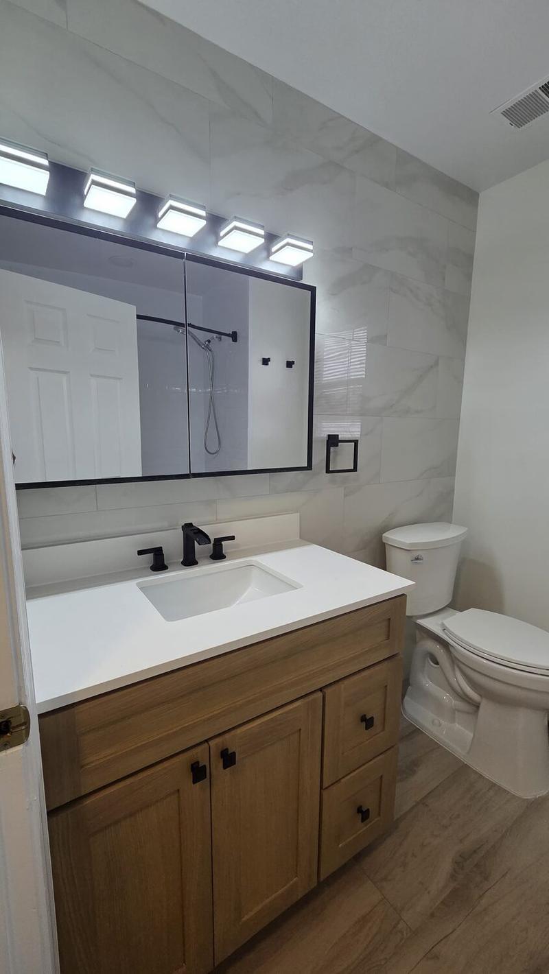 Condo unit bathroom renovation by KJ Commercial for a Hudson County NJ association